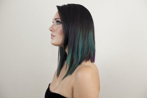 Hair coloring in The Colony, TX with black and teal balayage