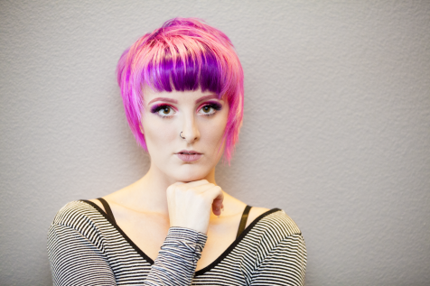 Haircut and hair coloring in Allen, Texas in pink and purple modern style